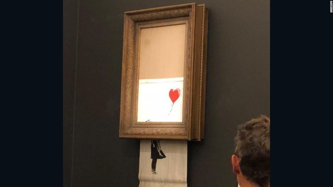 バンクシー絵画、１億５千万円で落札 直後にシュレッダーで「自滅