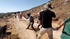 ユダヤ人入植者が農民と外国人活動家を襲撃　ヨルダン川西岸